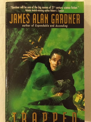 James Alan Gardner Trapped book used, English