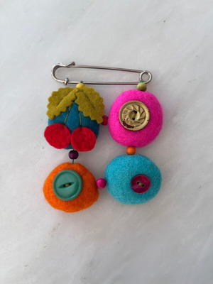 Handmade pin like new, multicolored