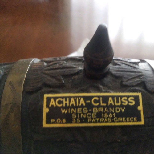 Antique barrel used with brass cups and carvings