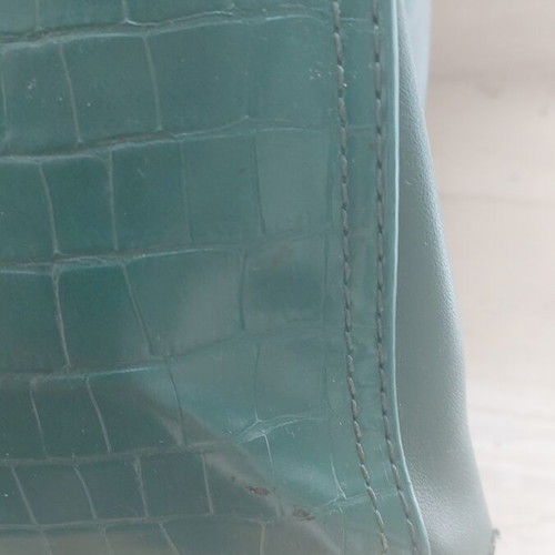 David Jones green backpack used with internal pocket repair needed