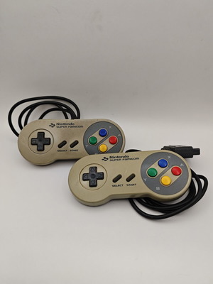Super Famicom controllers used, 2 pieces, for repair or parts
