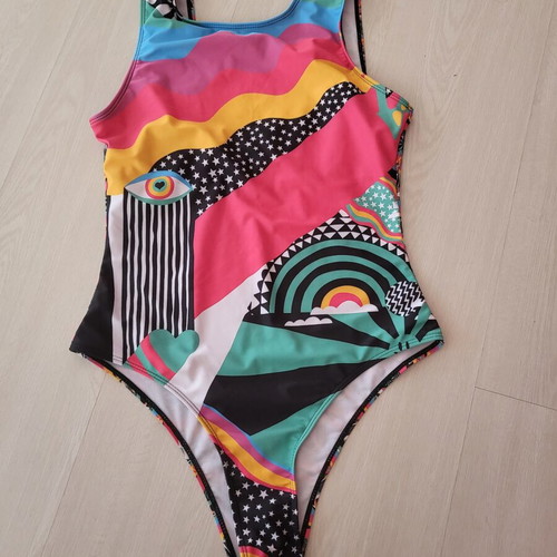 One-piece swimsuit like new, medium, colorful design with padding pocket