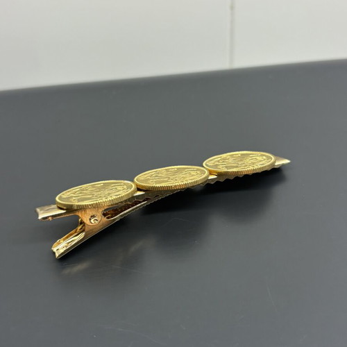 Gold-plated hair clip with 3 English coins used