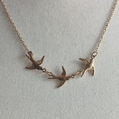 Necklace new with birds gold-colored