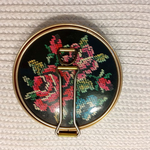 Vintage folding travel mirror with floral design