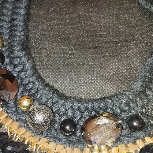 Knitted necklace new with black and gold beads