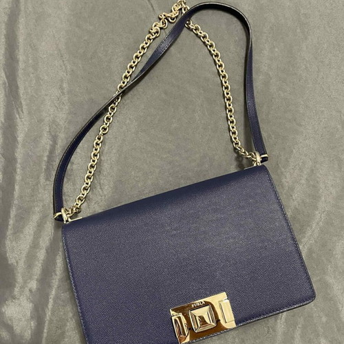Furla navy blue crossbody bag with gold details
