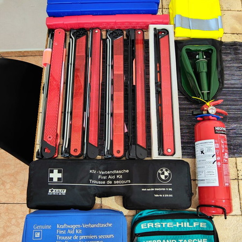 Car safety kit with fire extinguisher, triangles, first aid kits, shovel, vest