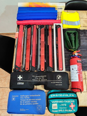 Car safety kit with fire extinguisher, triangles, first aid kits, shovel, vest