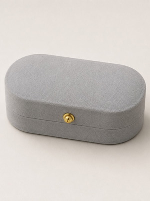 Jewelry box like new, gray suede with gold clasp
