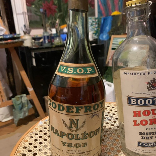 Hennessy cognac 1950 and gin 1960 bottles unopened