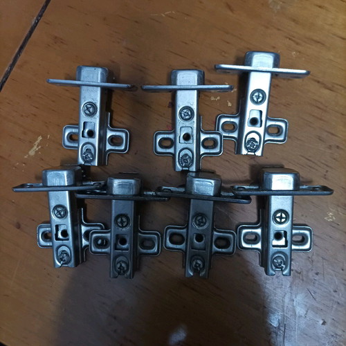 Cabinet hinges used, set of 7 pieces