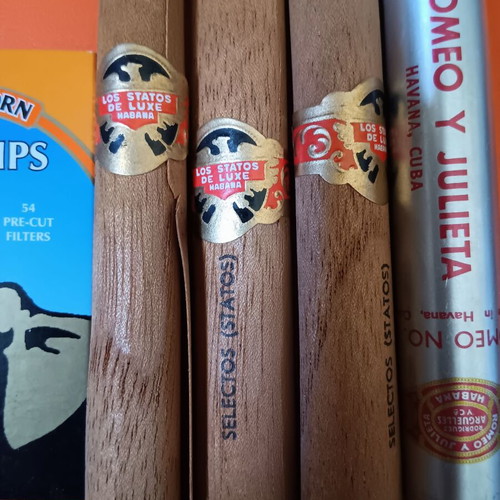Lot of 7 used collectible cigar and tobacco packages, empty