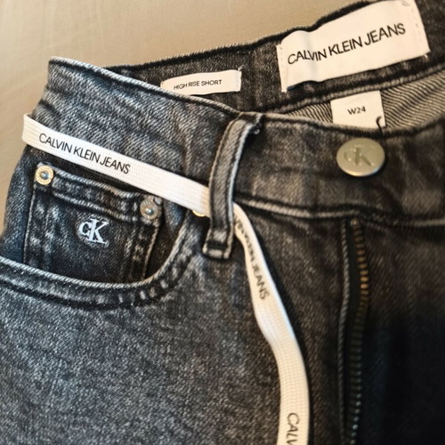 Calvin Klein denim shorts used, size 24