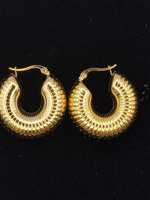 Spiral earrings made of gold-colored stainless steel new