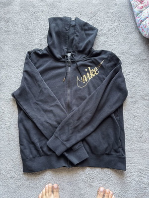 Nike black jacket Small used with gold details
