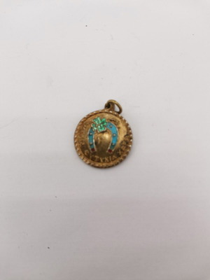 Silver New Year charm used from 1962