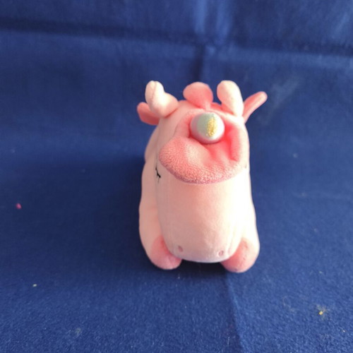 Pink plush unicorn with colorful wings