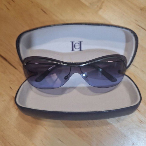 Carolina Herrera vintage women's sunglasses used, purple butterfly design