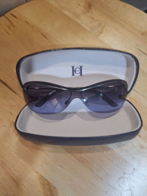 Carolina Herrera vintage women's sunglasses used, purple butterfly design