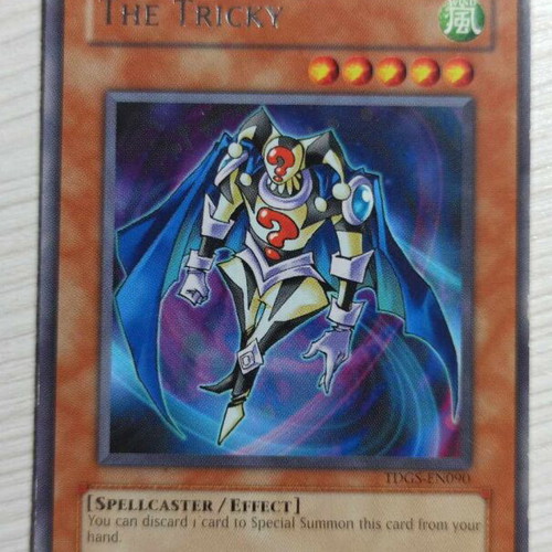 The Tricky TDGS-EN090 authentic Yugioh card used, mid condition