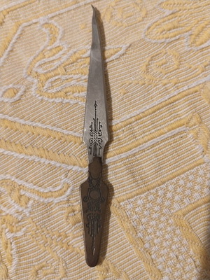 Vintage metal sewing stiletto with Art Nouveau motifs