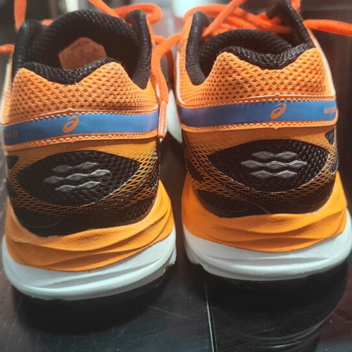 Asics Cumulus 17 running shoes, size 38, black and orange