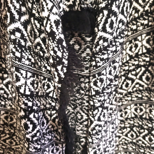 Asymmetric cardigan used with boho style, black and white
