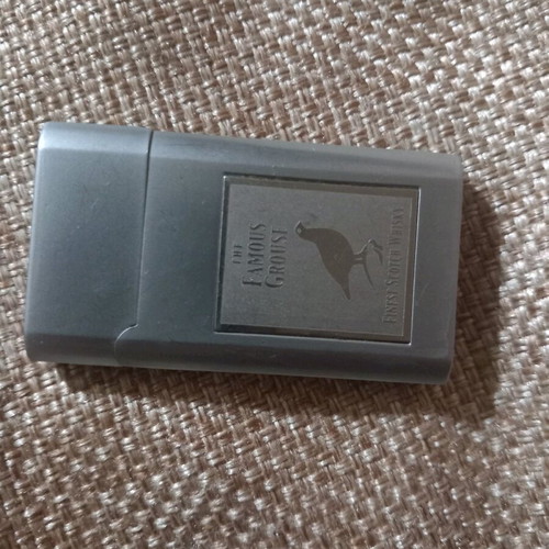 FAMOUS GROUSE collectible lighter used