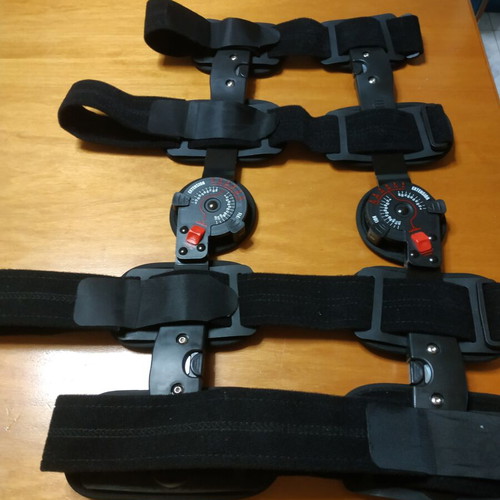 Orthopedic knee brace like new with adjustable straps and tension buttons