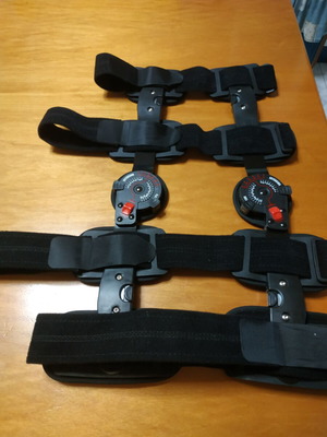 Orthopedic knee brace like new with adjustable straps and tension buttons