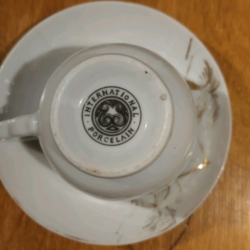 Collectible old coffee cup used from Japan with saucer