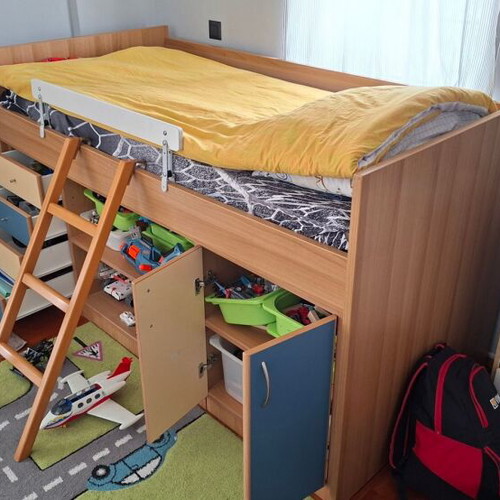 Children's loft bed with ladder and storage used