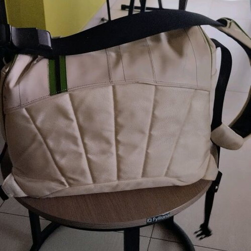Crumpler professional photographer bag used with multiple compartments
