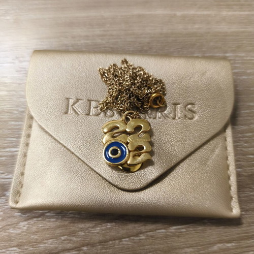 Pendant jewelry 2022 charm with eye, like new, gold color