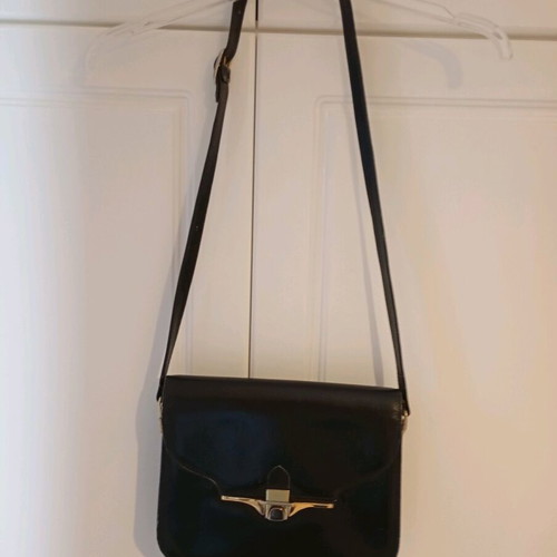 Black leather shoulder bag used with minimal wear