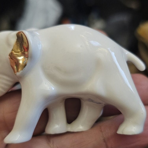 Sitzendorf porcelain elephant used, with leg flaw