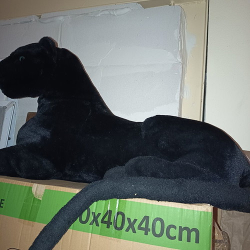 Large plush black panther with blue eyes, like new