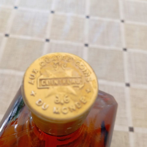 Cointreau collectible bottle, amber