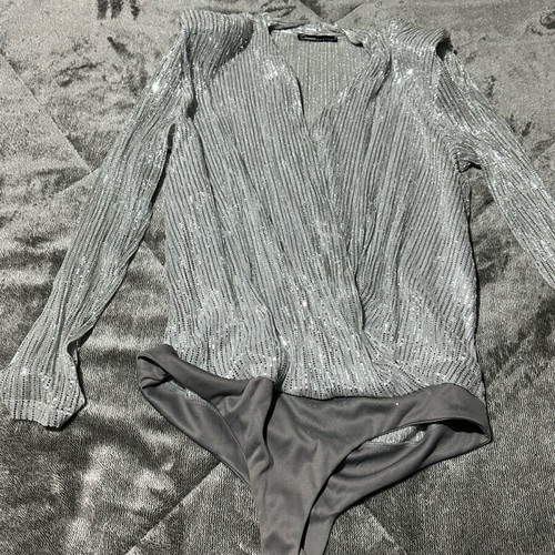 Donna silver sequin bodysuit like new size Large