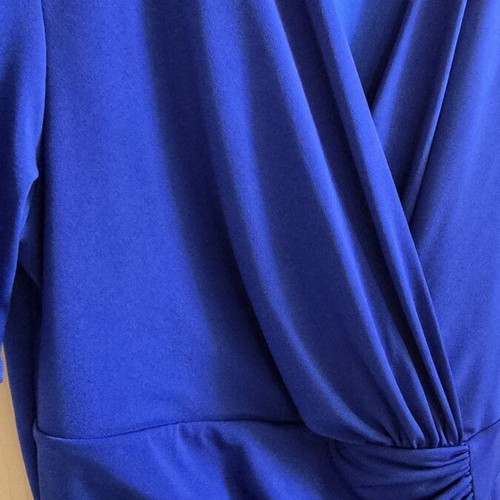 Blue elegant dress with short sleeves and wrap design
