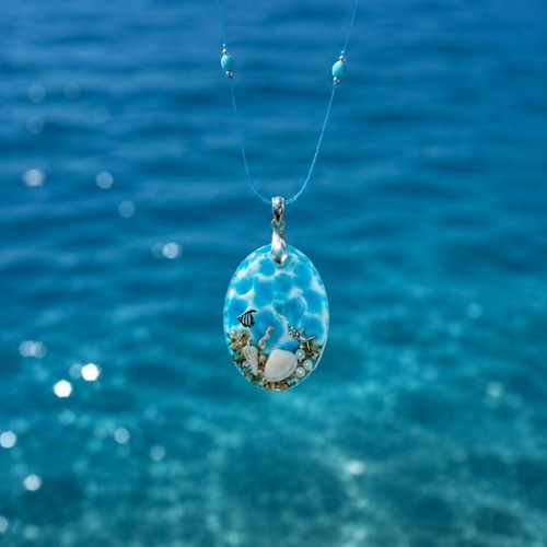 Handmade necklace with turquoise semiprecious stones and glass pendant