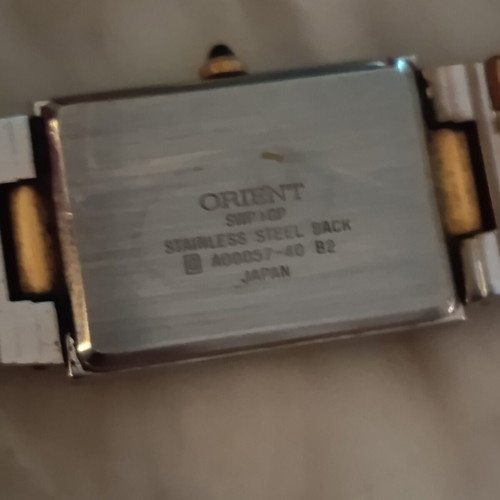 Orient quartz women's watch like new, gold and silver