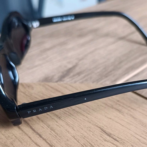 Prada women's sunglasses used, model SPR 06A 1AB-1A1, black