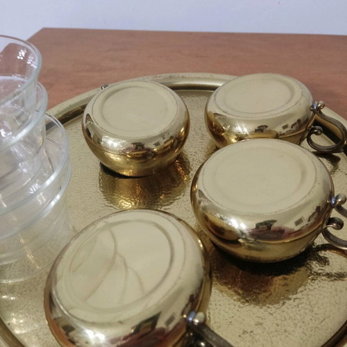 Bronze tea cups with glass on tray used