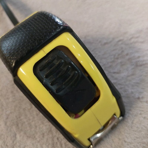 Measuring tape 5m x 25 mm used with defective large button