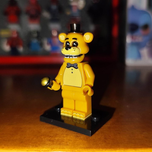 Golden Freddy figure like new with stand and microphone