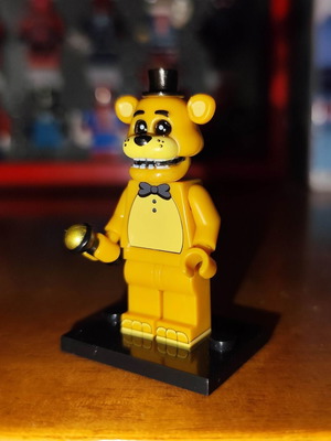 Golden Freddy figure like new with stand and microphone