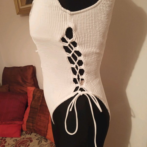 One-piece swimsuit used, white, size M with laces