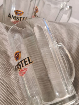 Amstel cricket beer glasses like new, set of 2
